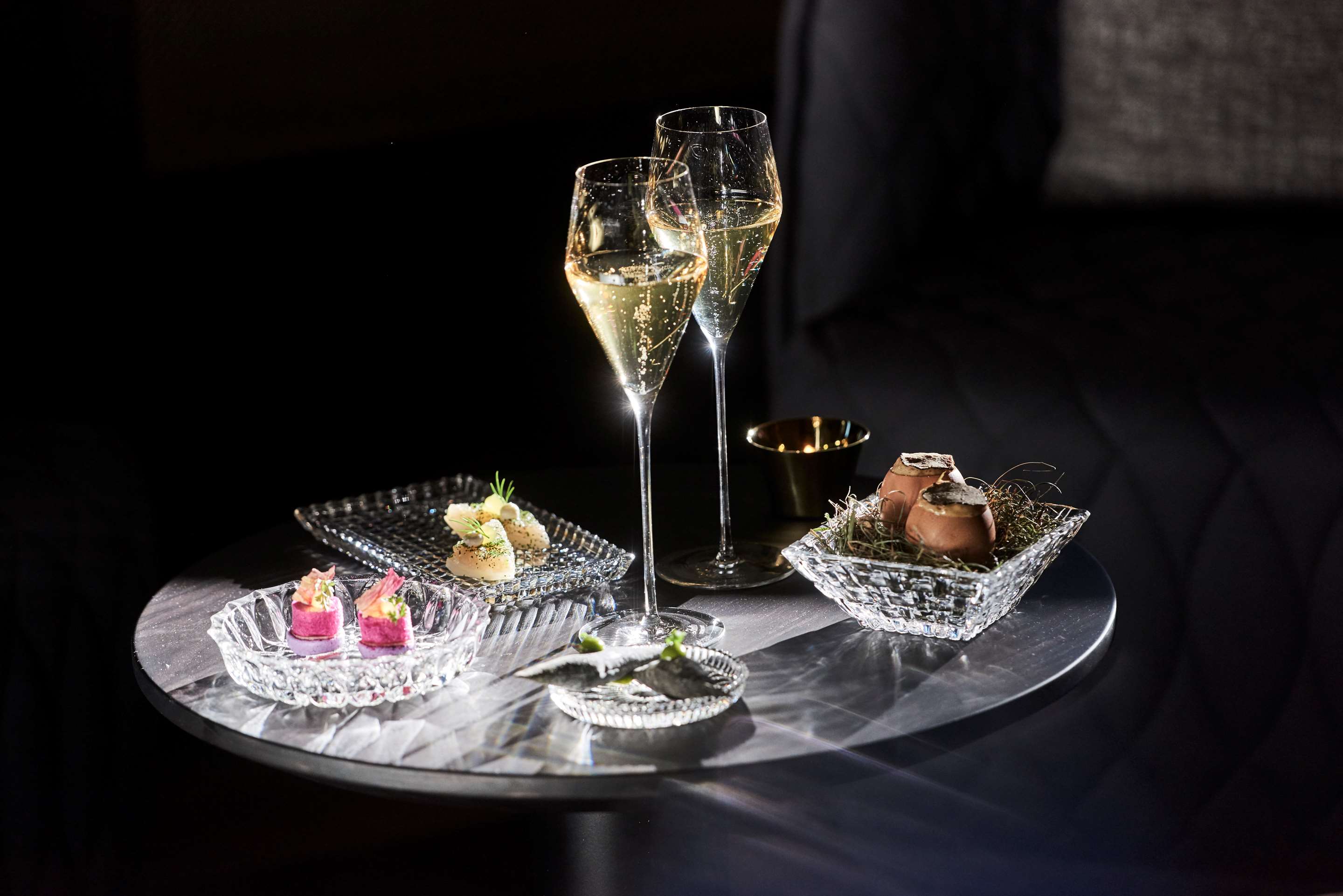 Champagne and Amuse Bouche at IGNIV by Andraes Caminada