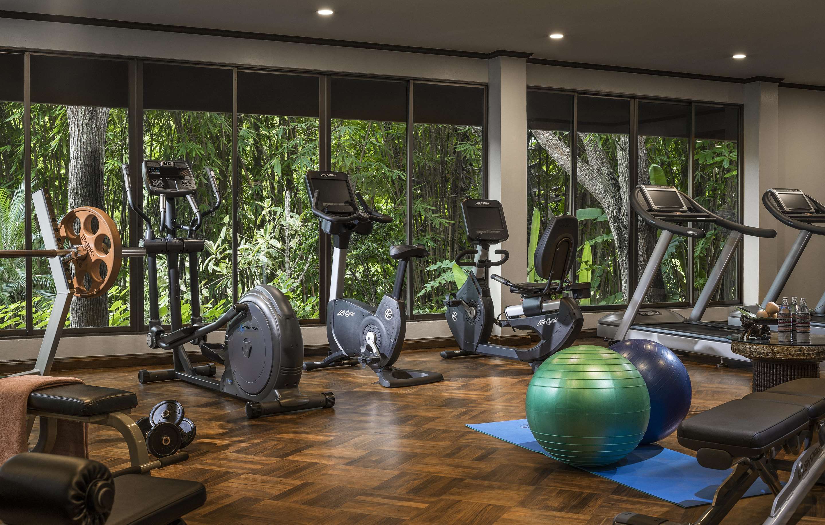 Interior of fitness center with range of equipment