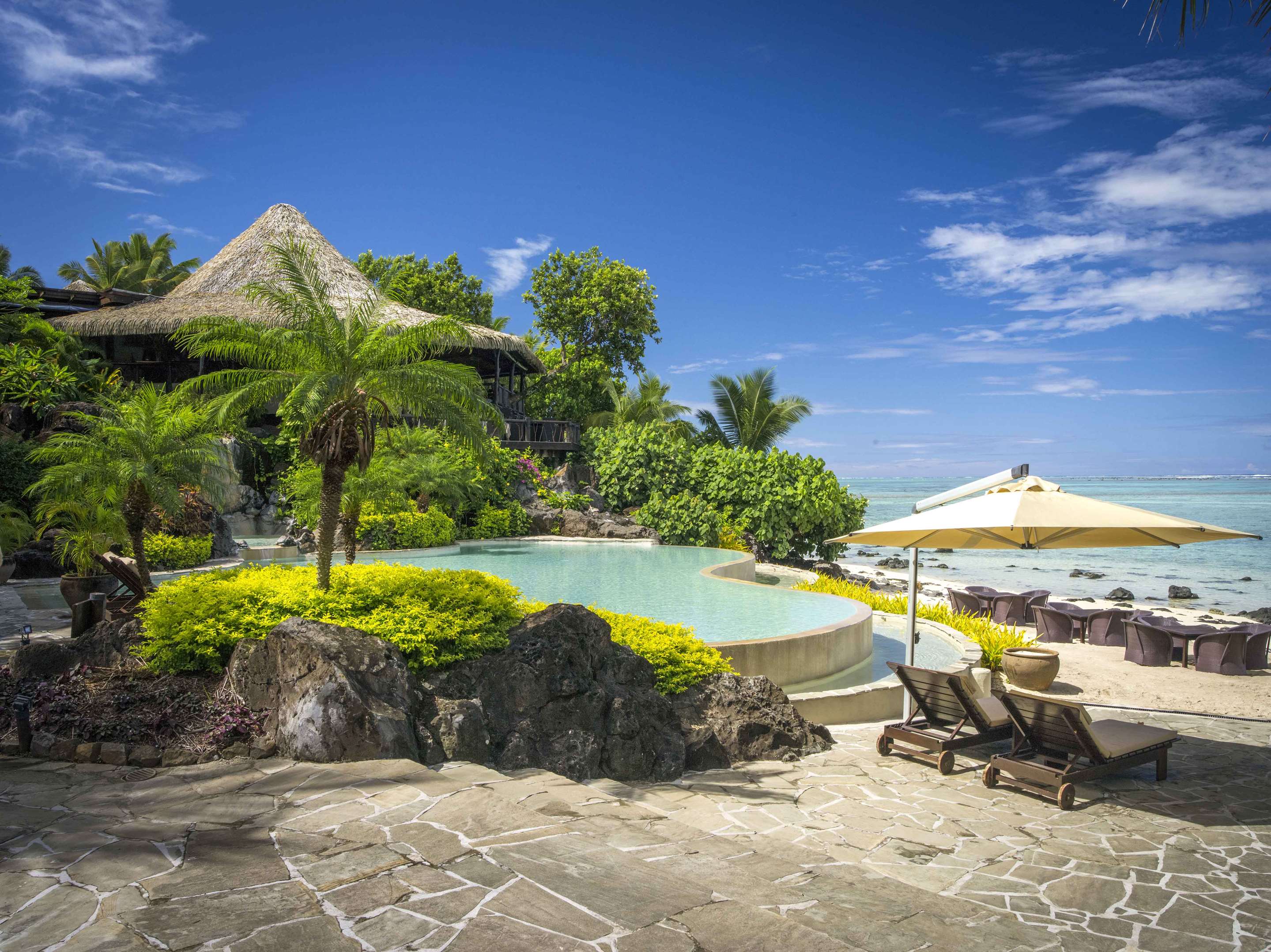 Pacific Resort Aitutaki Pool and Loungers