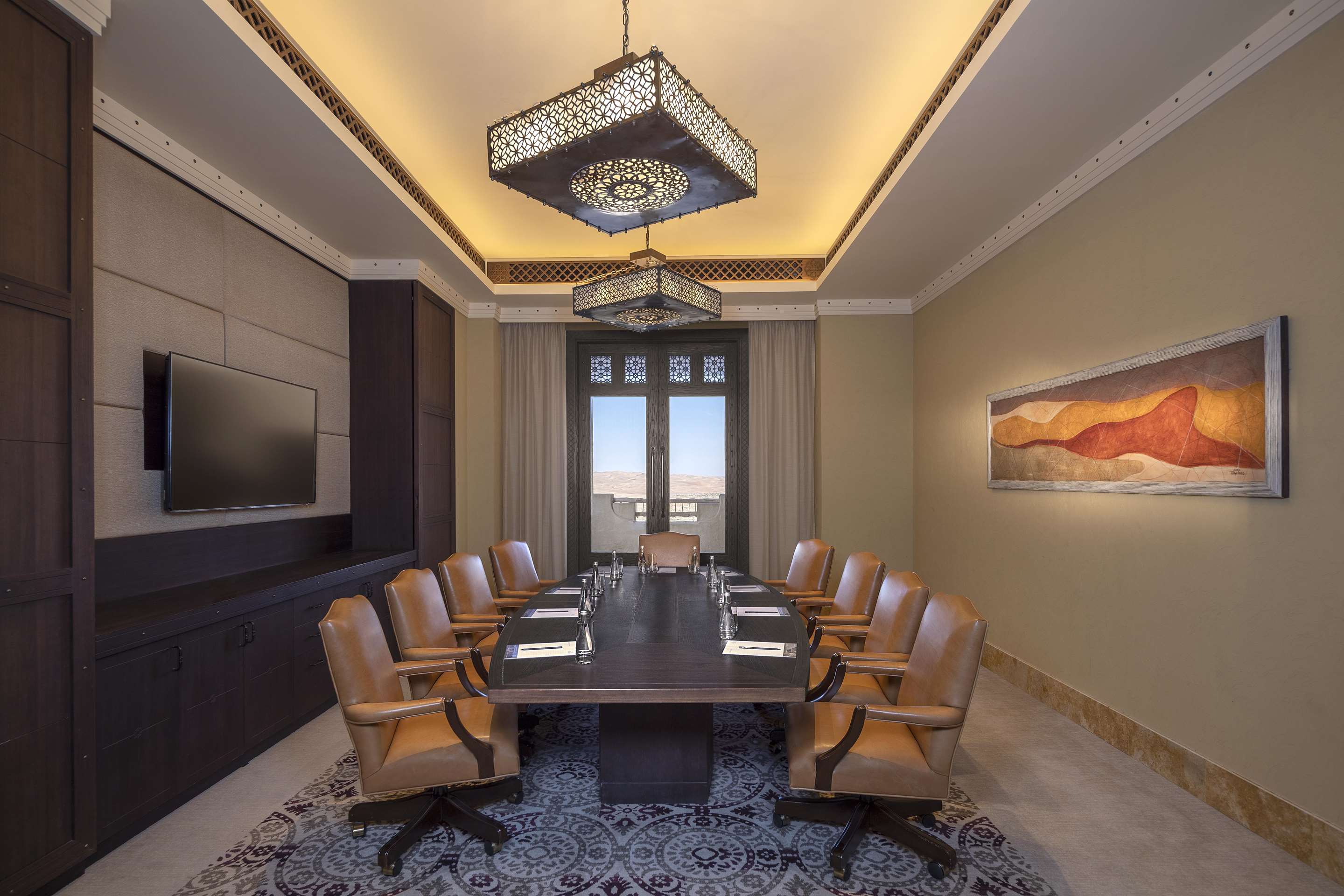 Boardroom set-up in meeting room with desert view
