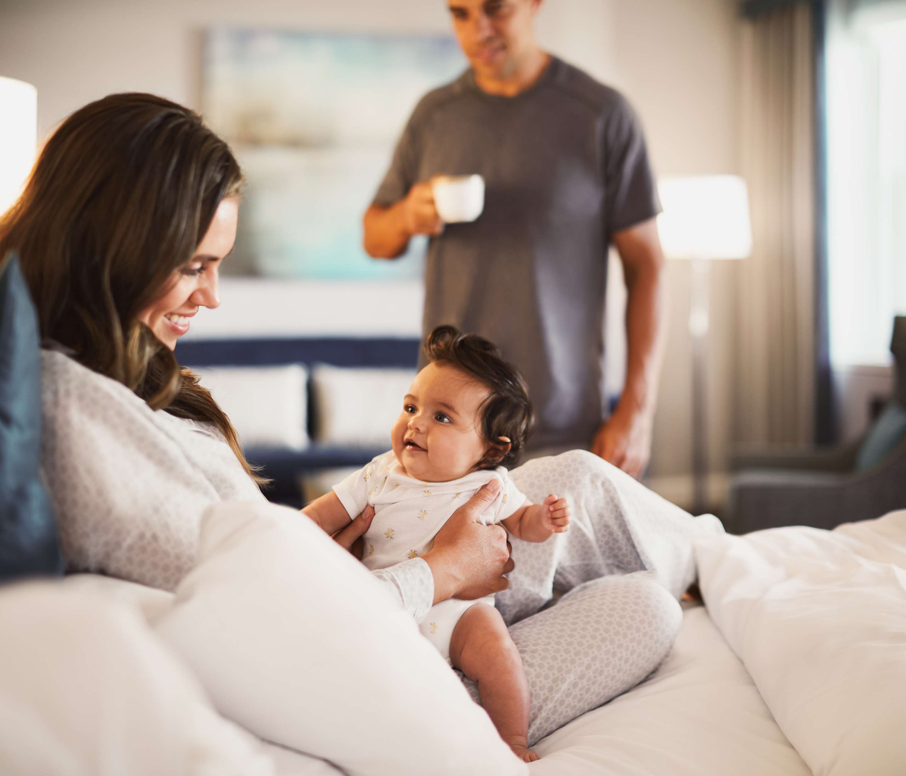 Room mom and baby on bed
