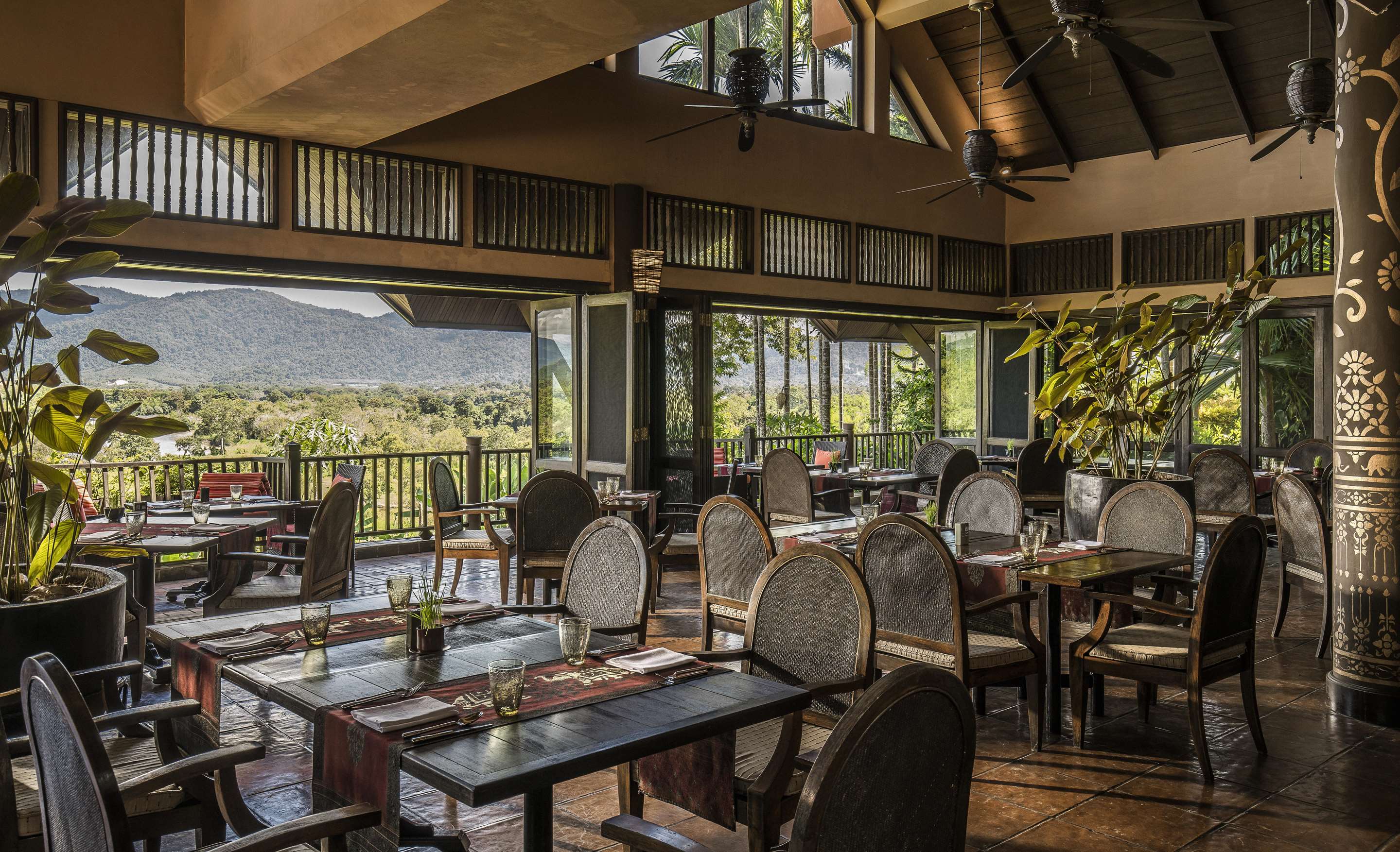 Seating setup with tables and chairs of the Sala Mae Nam Restaurant